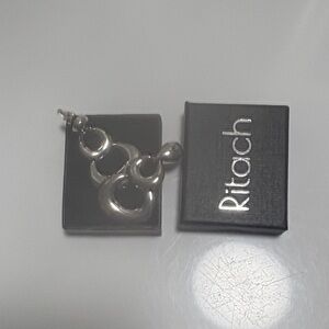 TACH Silver Loop Earrings